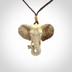 These are hand made elephant pendants, carved in a Deer Antler. The cord is length adjustable. Provided in a woven kete pouch and delivered with express courier.
