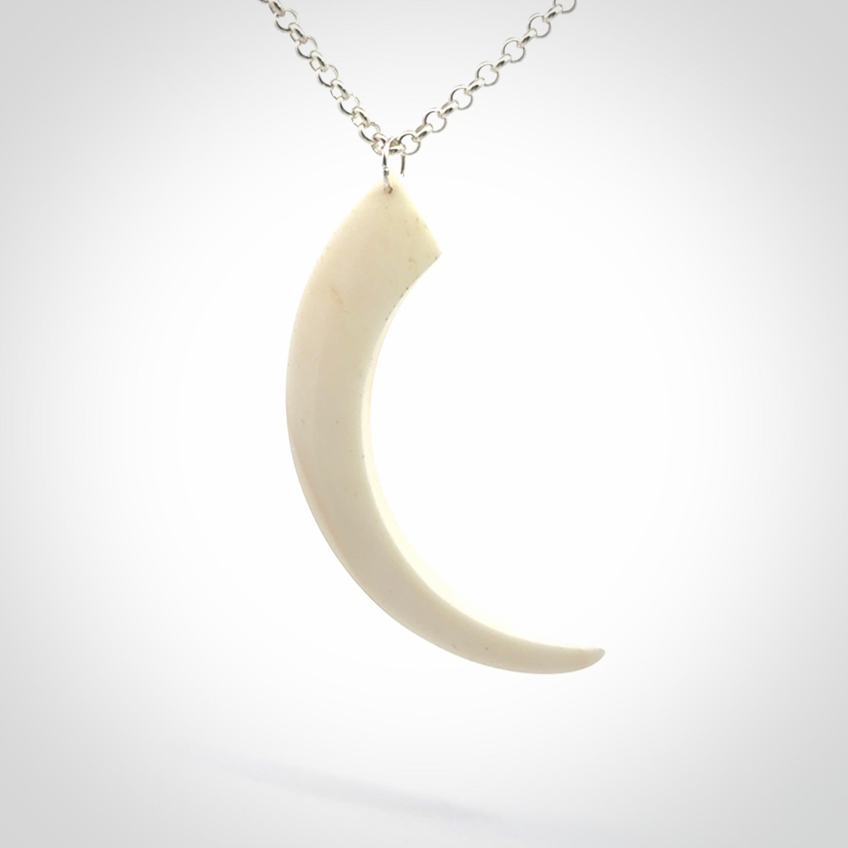 Hand carved incredible Huia bird beak bone carving. A stunning work of art, beautifully replicating a hula bird beak. This pendant was hand carved in bone by artist Sami. A one off collectors item that has been hand crafted to be worn or displayed.