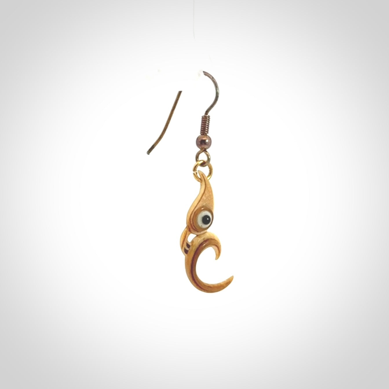 A beautiful woolly mammoth tusk earring.