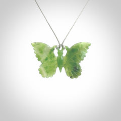 Large Butterfly design pendant carved in nephrite jade. Real jade jewellery for sale online with NZ Pacific. Large butterfly pendant hand made in Jade, provided with adjustable cord and packaged in a woven kete pouch.