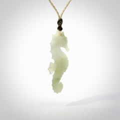 A hand carved Jadeite seahorse pendant. We have carved this from beautiful jadeite and we bind them with our hand-plaited cords. The cords are a waxed polyester so they are durable and strong. We ship these worldwide with express courier anywhere in the world.
