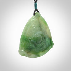 Hand carved contemporary jade third eye pendant. Authentic jade jewellery for sale online. Third eye Jade necklace with adjustable cord.