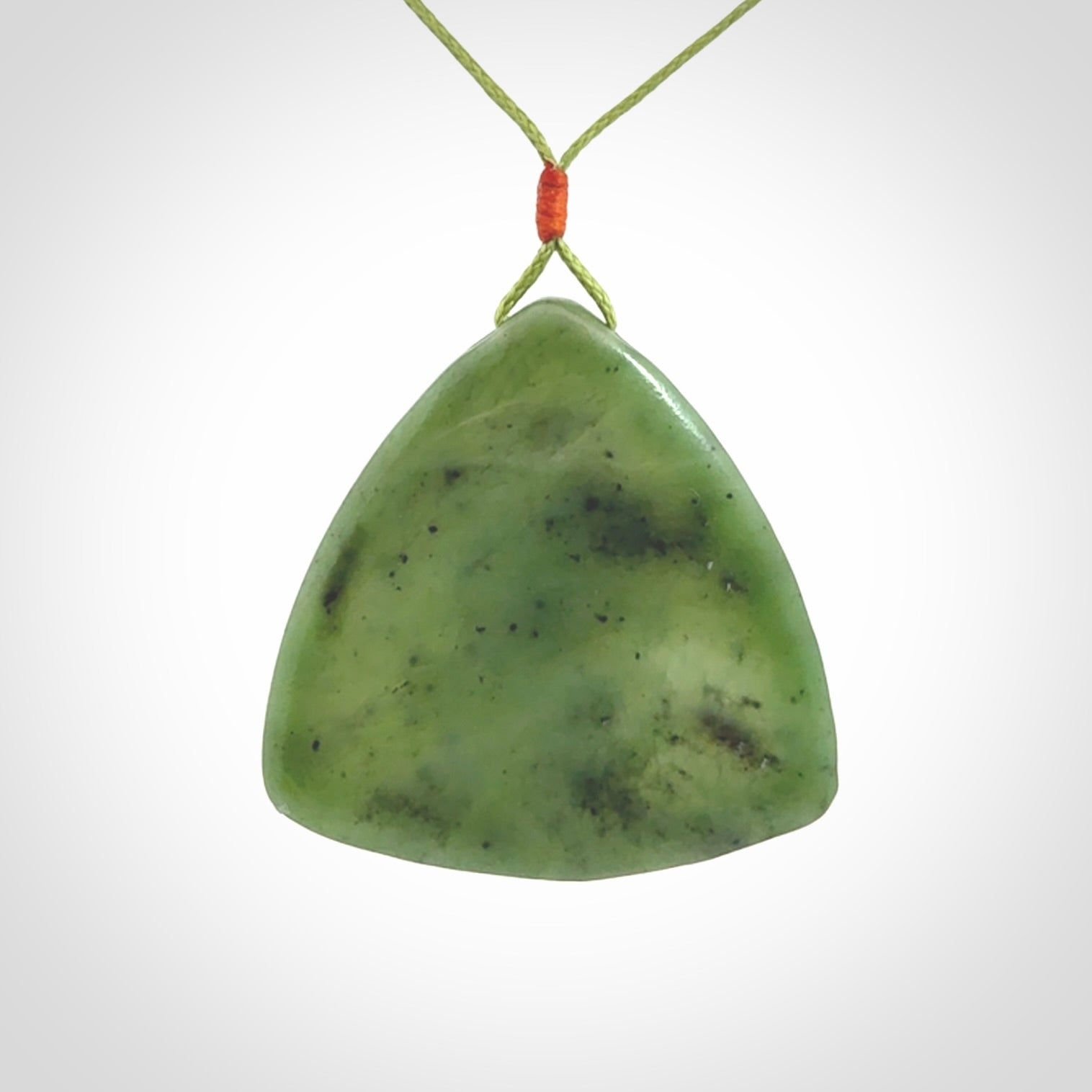 Hand carved contemporary jade third eye pendant. Authentic jade jewellery for sale online. Third eye Jade necklace with adjustable cord.
