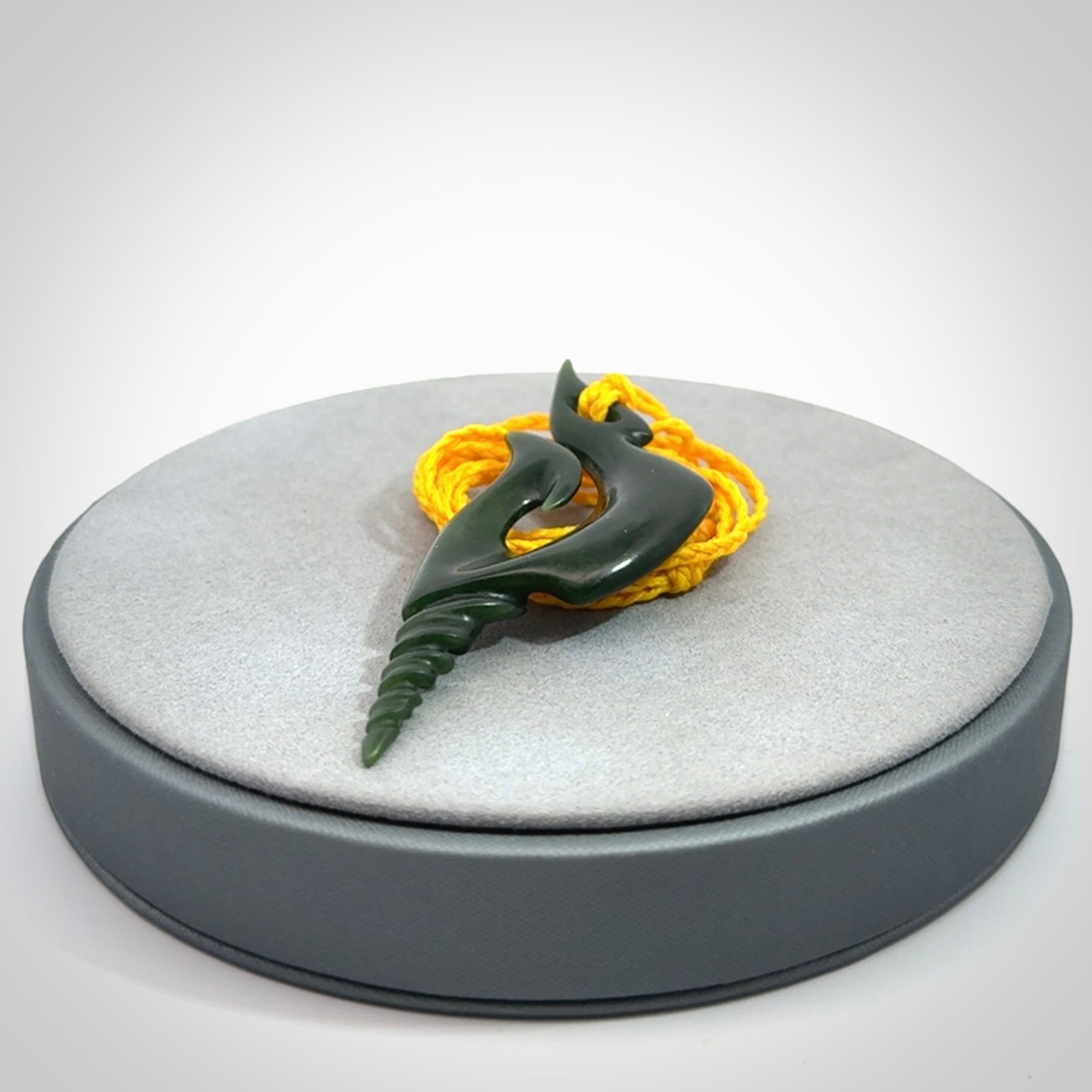 Hand carved New Zealand Jade hook pendant