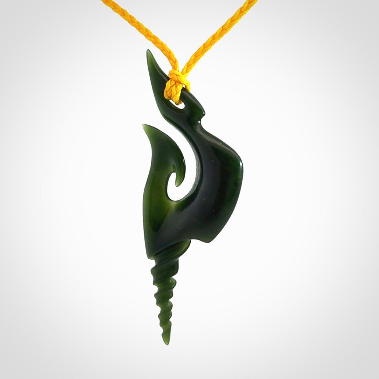 Hand carved New Zealand Jade hook pendant