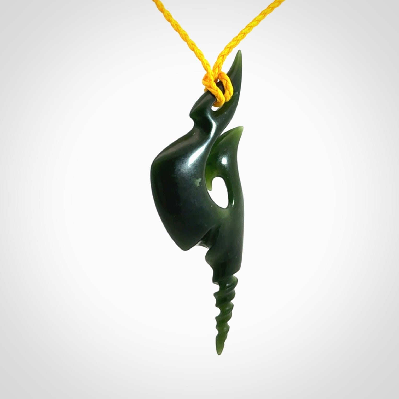 Hand carved New Zealand Jade hook pendant