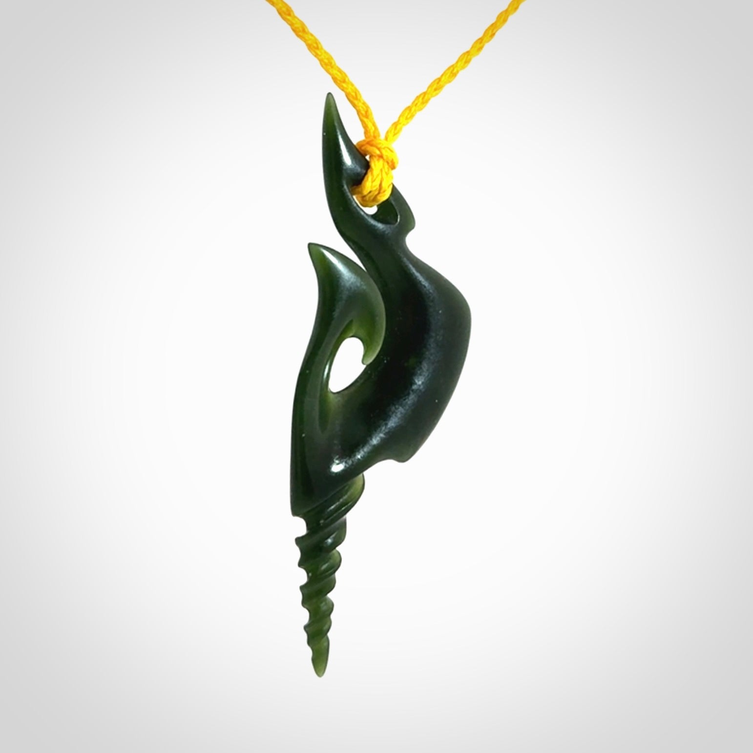 Hand carved New Zealand Jade hook pendant