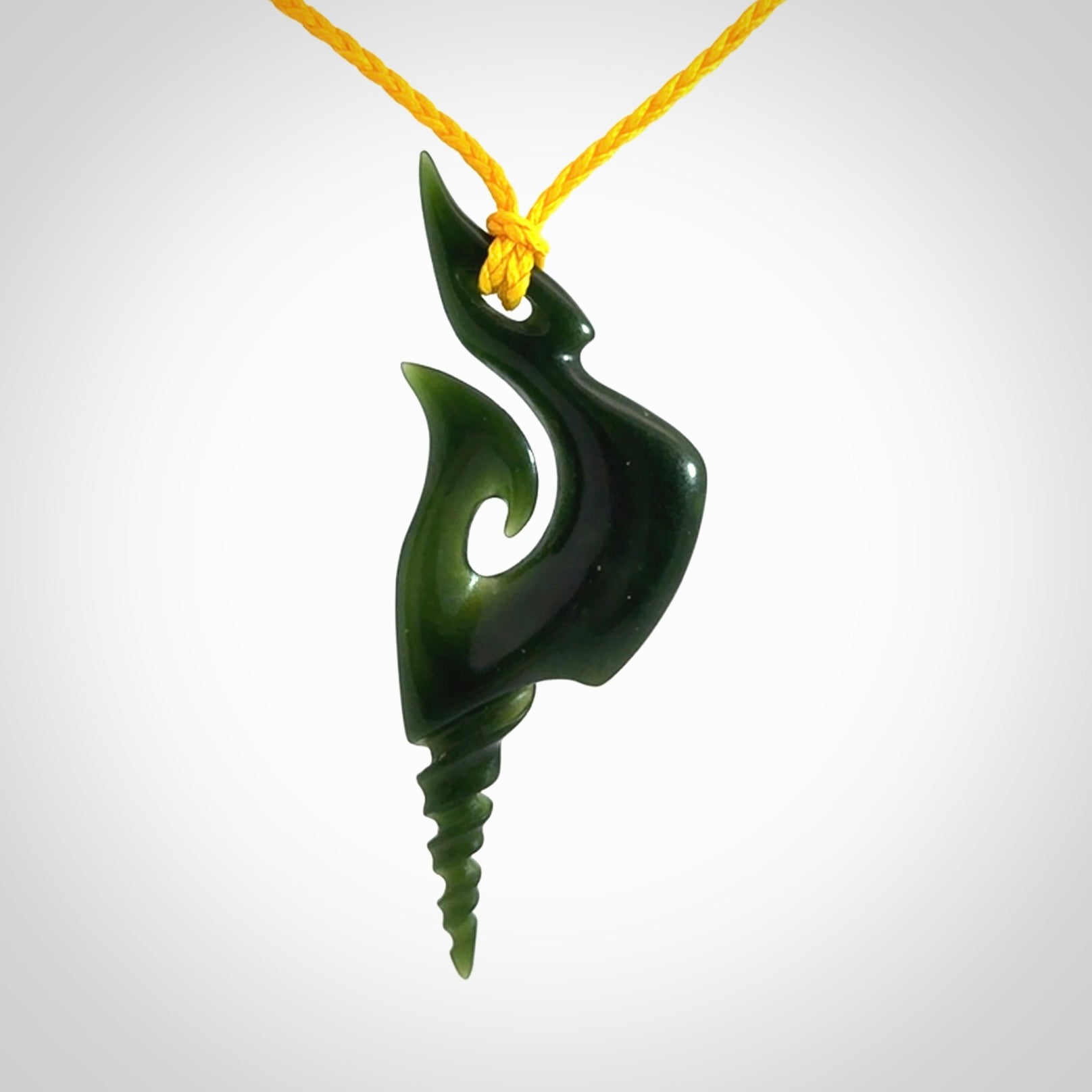 Hand carved New Zealand Jade hook pendant
