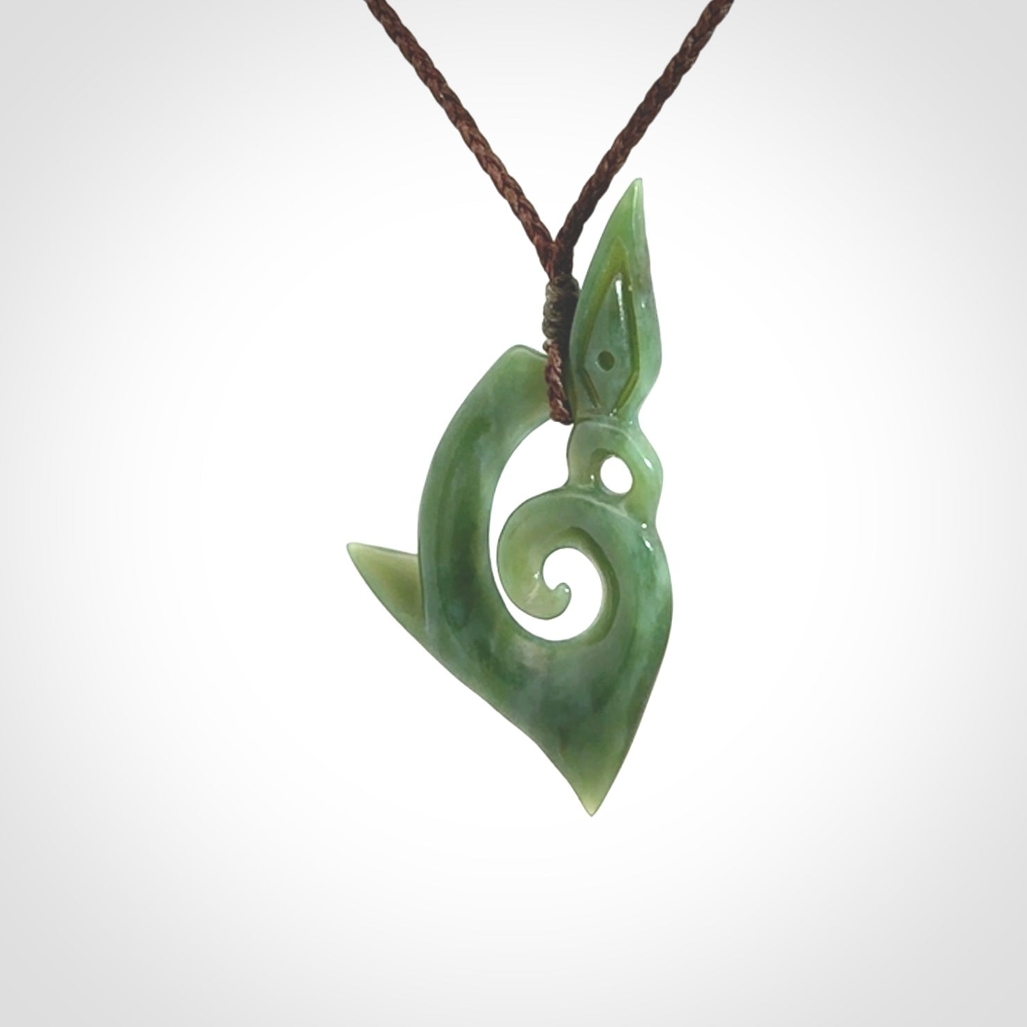 A Wonderful Inanga Manaia Koru Pendant