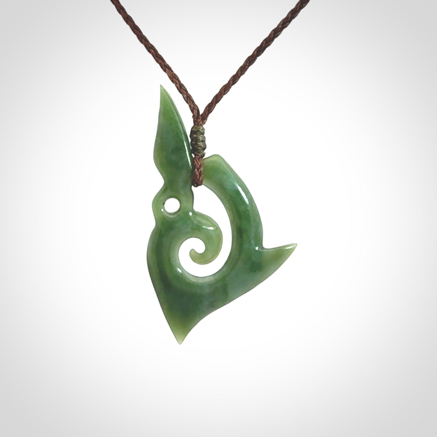A Wonderful Inanga Manaia Koru Pendant