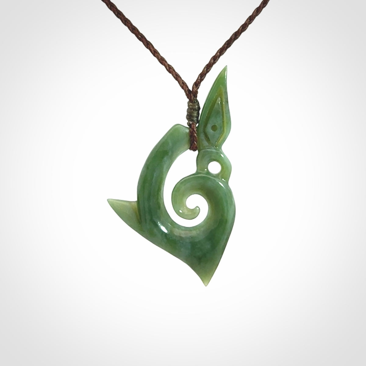 A Wonderful Inanga Manaia Koru Pendant