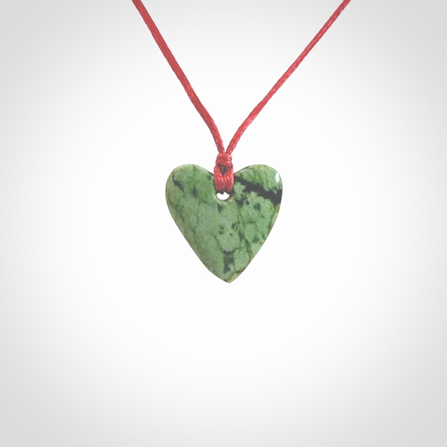 Hand carved small jade heart pendant