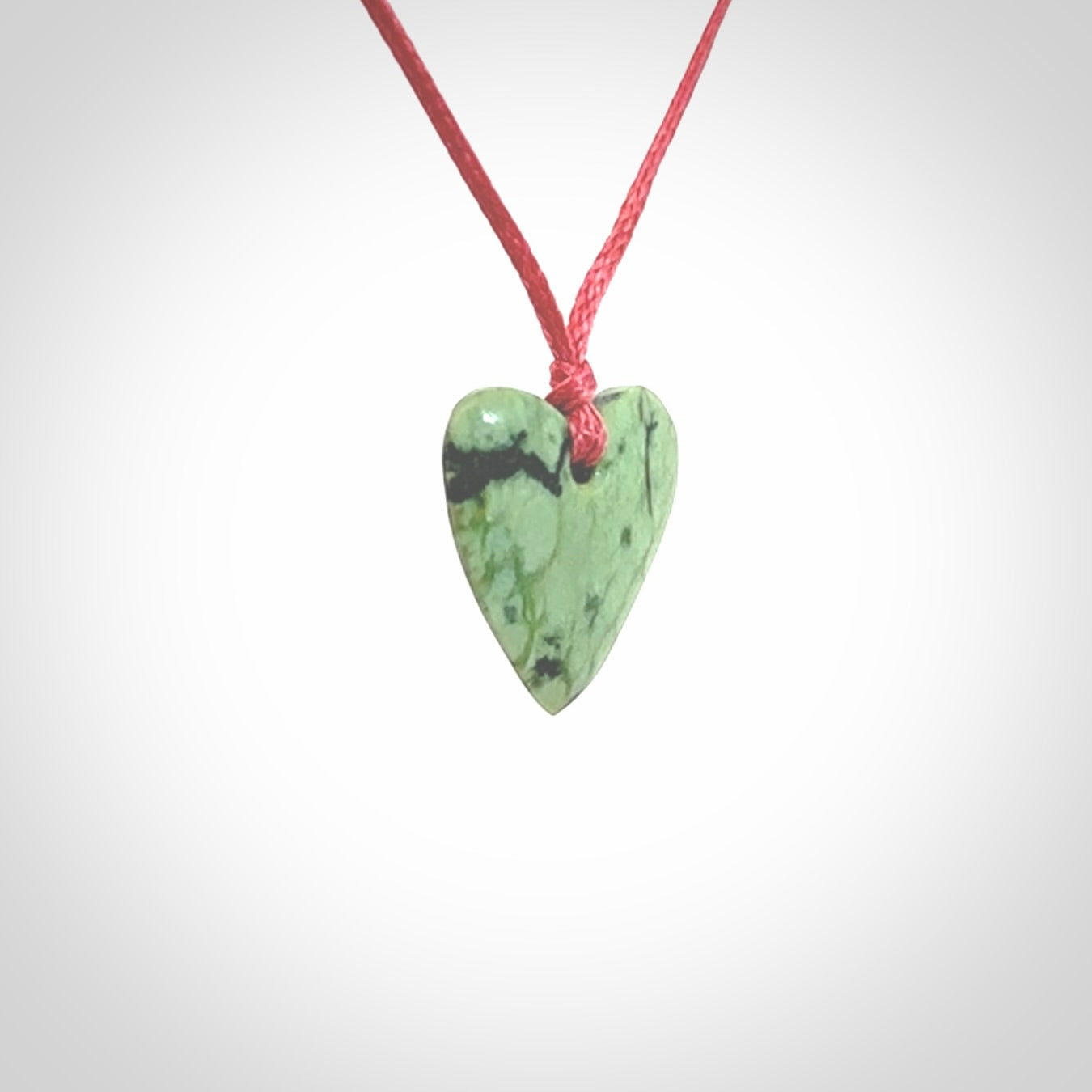 Hand carved small jade heart pendant