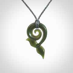 Hand carved New Zealand Jade whale tail koru pendant