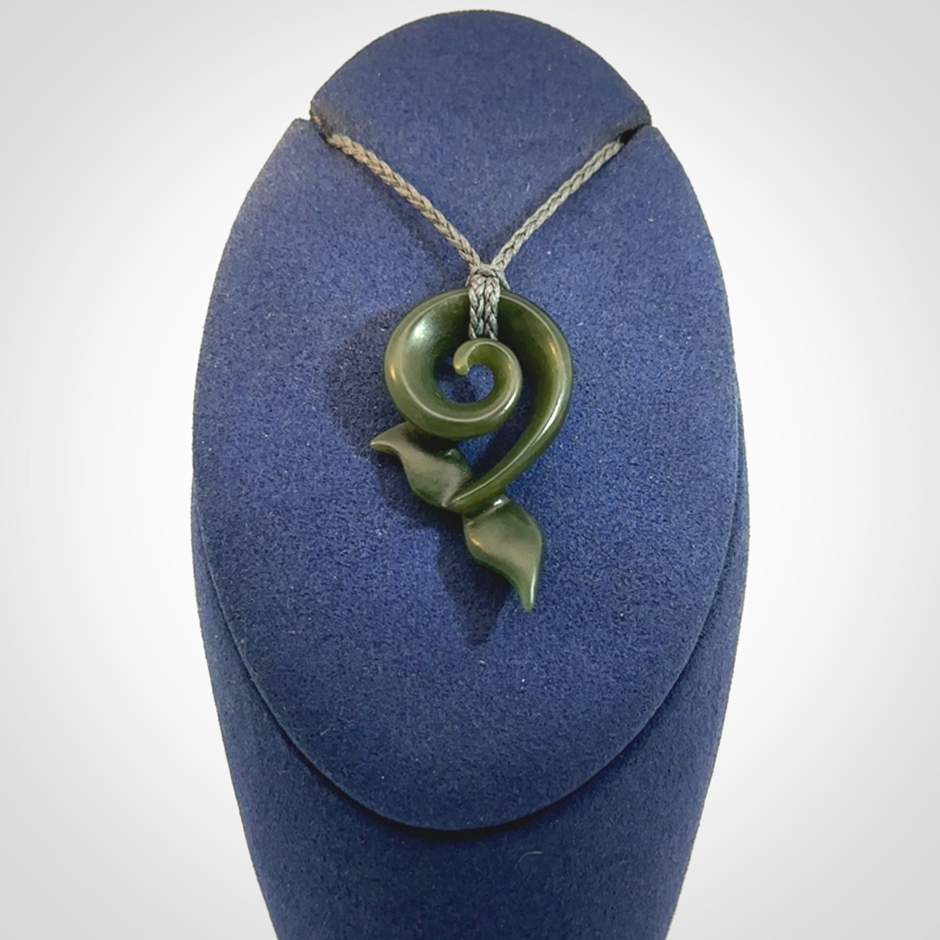 Hand carved New Zealand Jade whale tail koru pendant