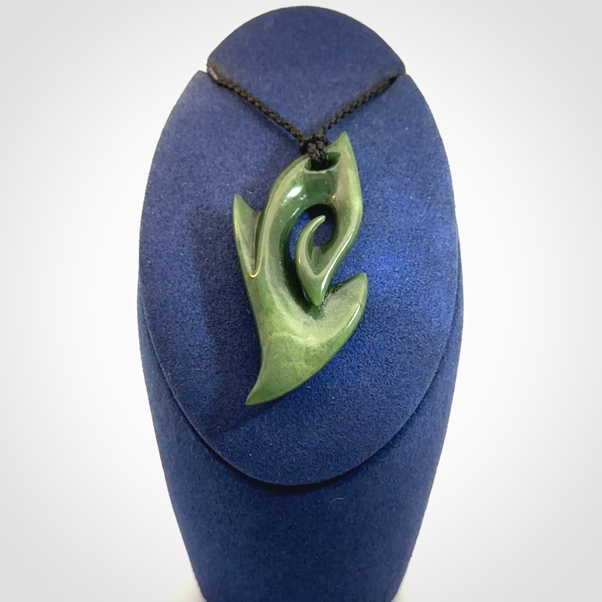 Hand Carved koru pendant in New Zealand Jade