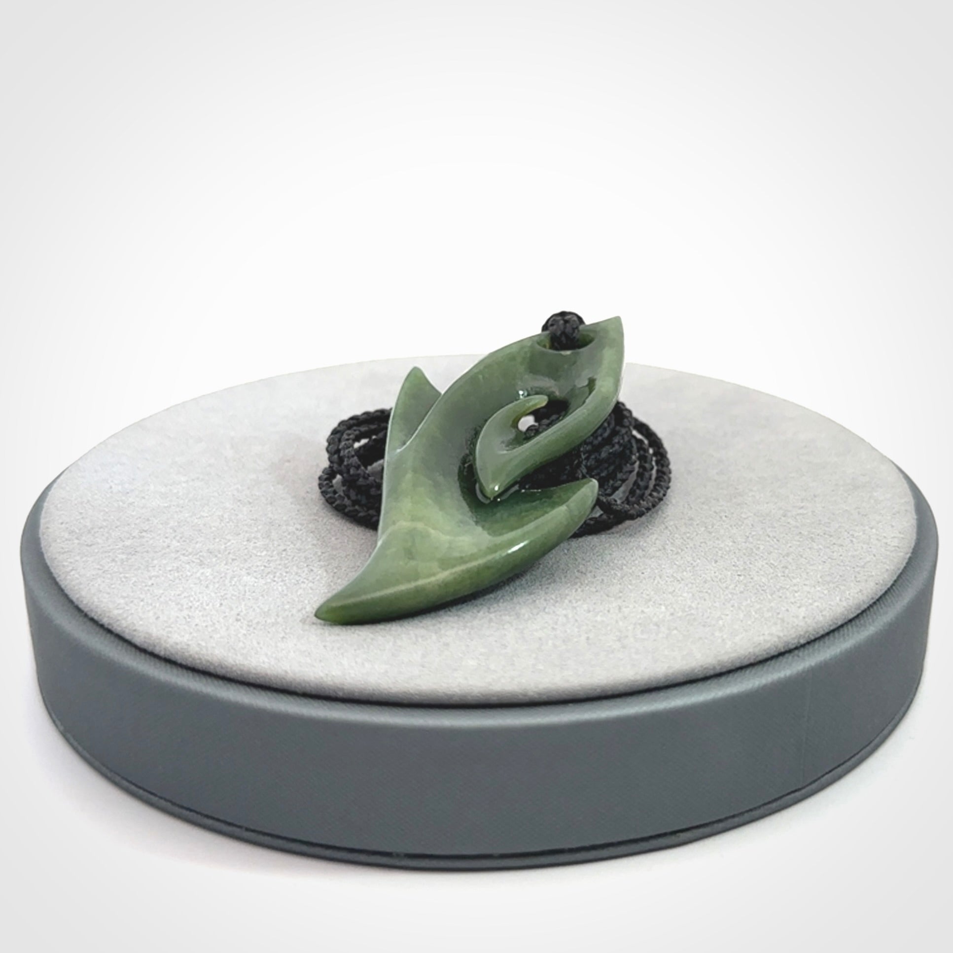 Hand Carved koru pendant in New Zealand Jade