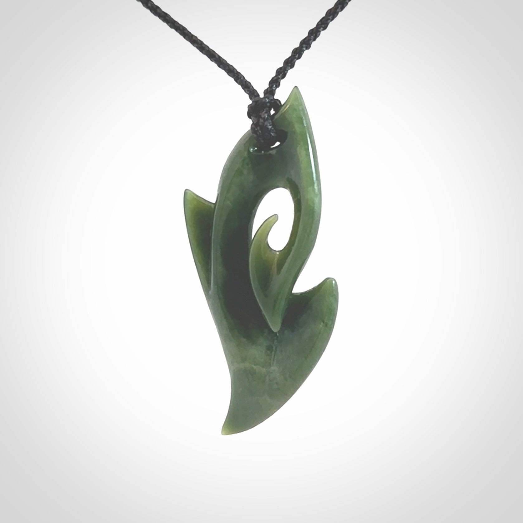 Hand Carved koru pendant in New Zealand Jade