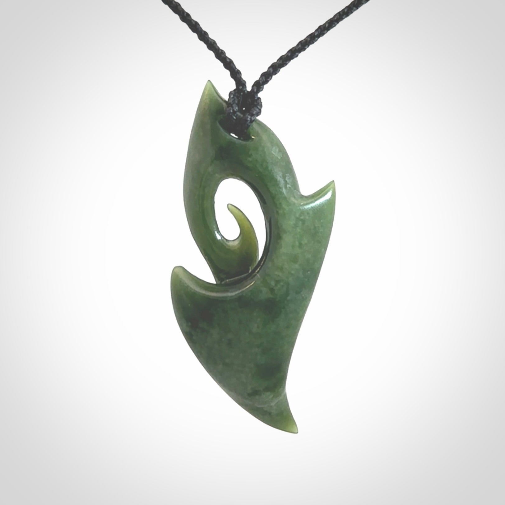 Hand Carved koru pendant in New Zealand Jade