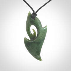 Hand Carved koru pendant in New Zealand Jade