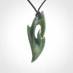 Hand Carved koru pendant in New Zealand Jade