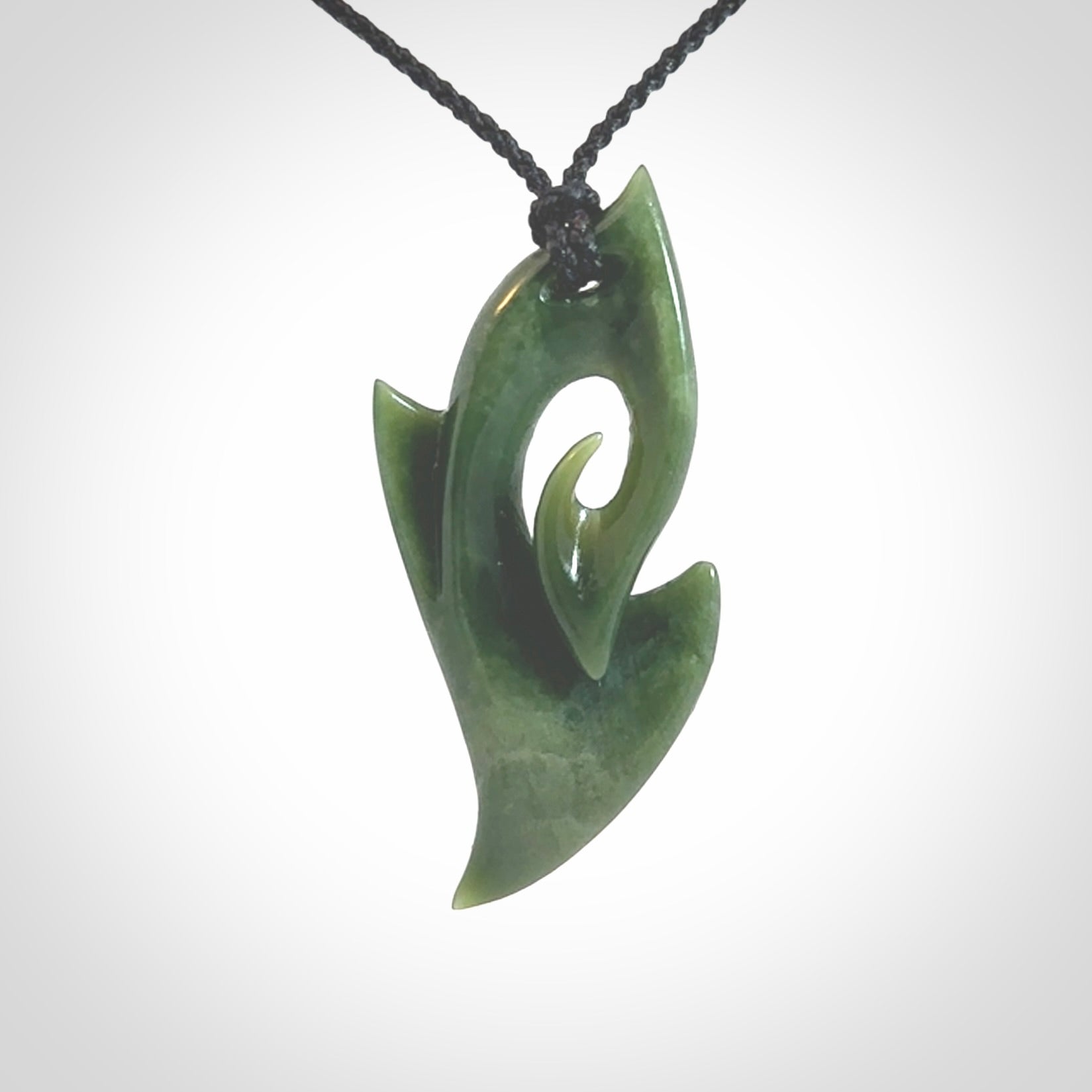 Hand Carved koru pendant in New Zealand Jade