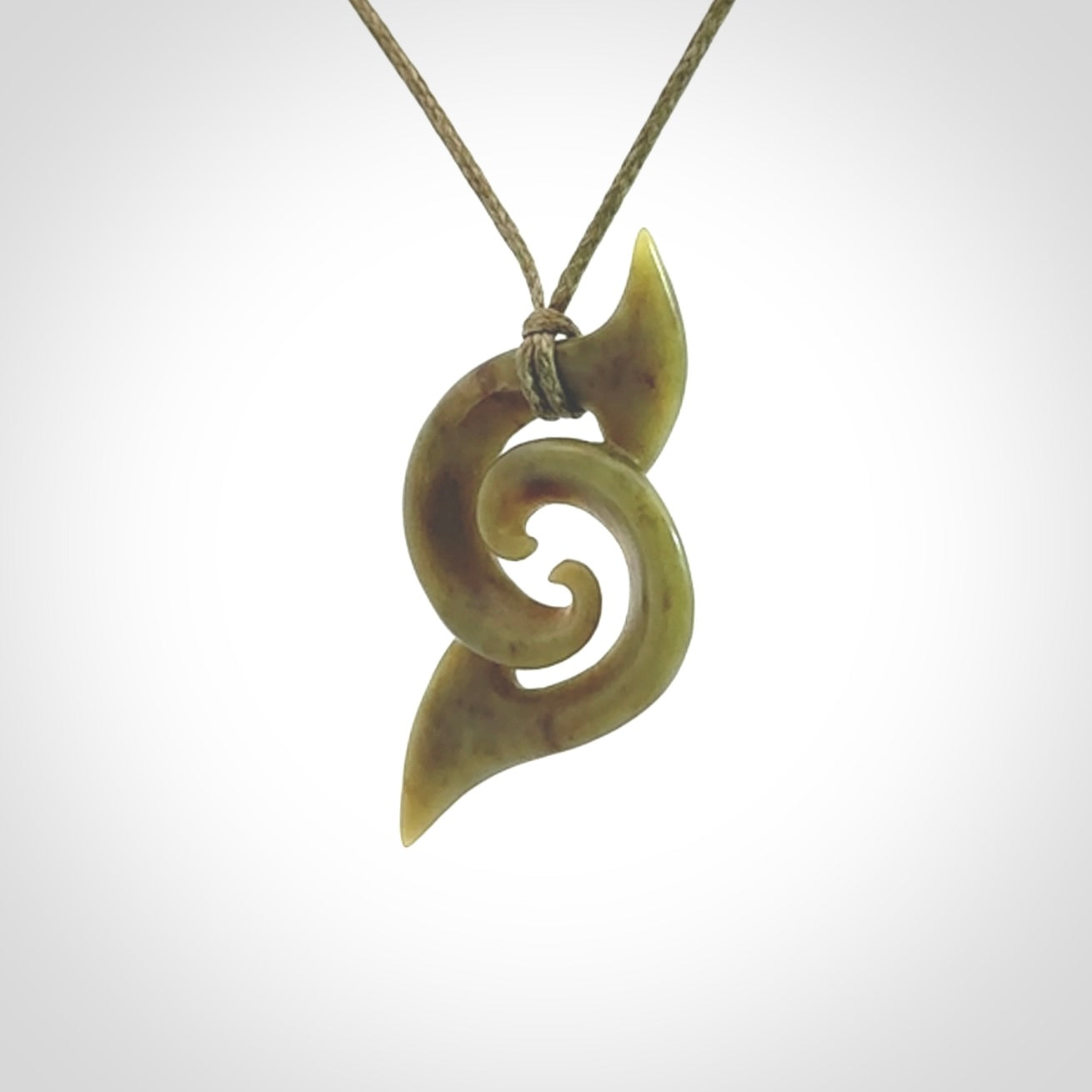 Hand carved New Zealand Jade koru pendant
