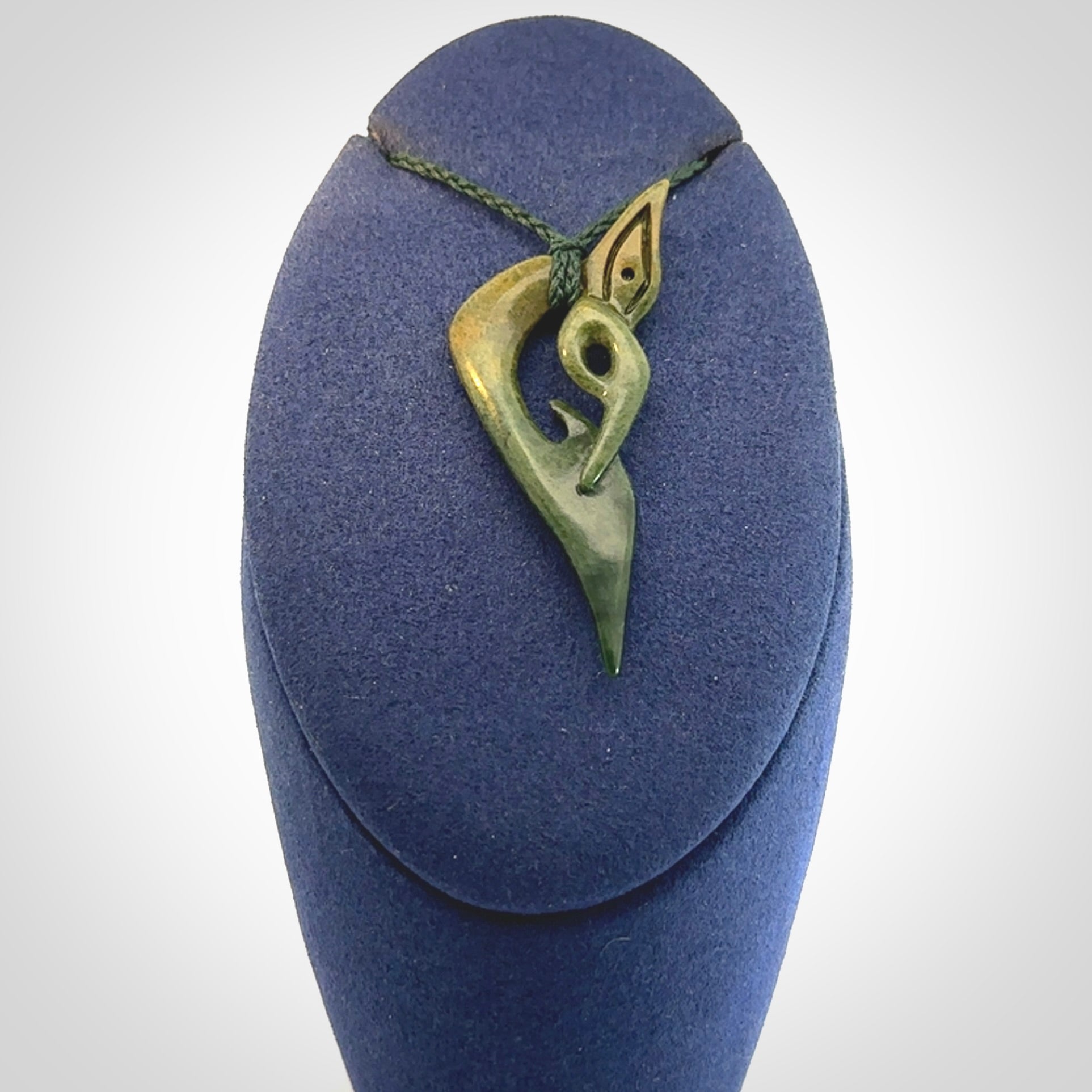 A Very Cool, Unique, Manaia Pendant, Carved in Flower Jade.