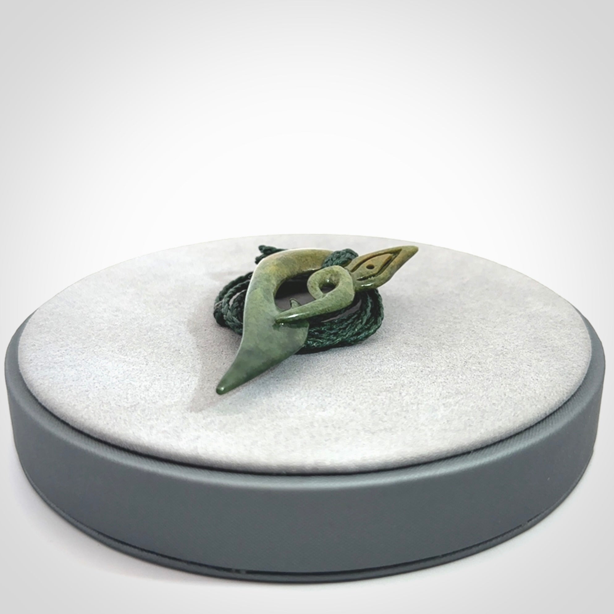 A Very Cool, Unique, Manaia Pendant, Carved in Flower Jade.