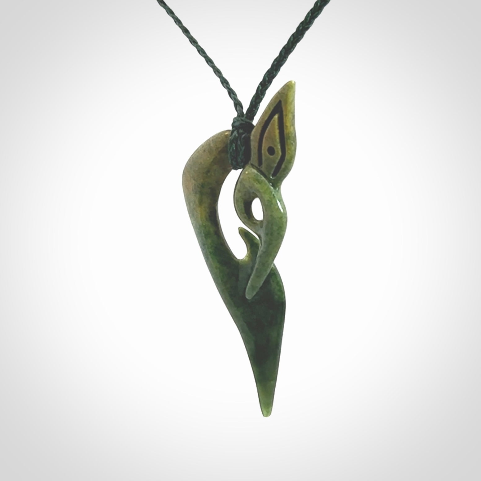 A Very Cool, Unique, Manaia Pendant, Carved in Flower Jade.