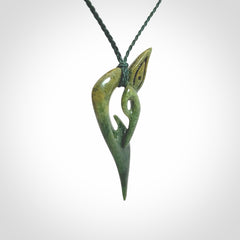 A Very Cool, Unique, Manaia Pendant, Carved in Flower Jade.
