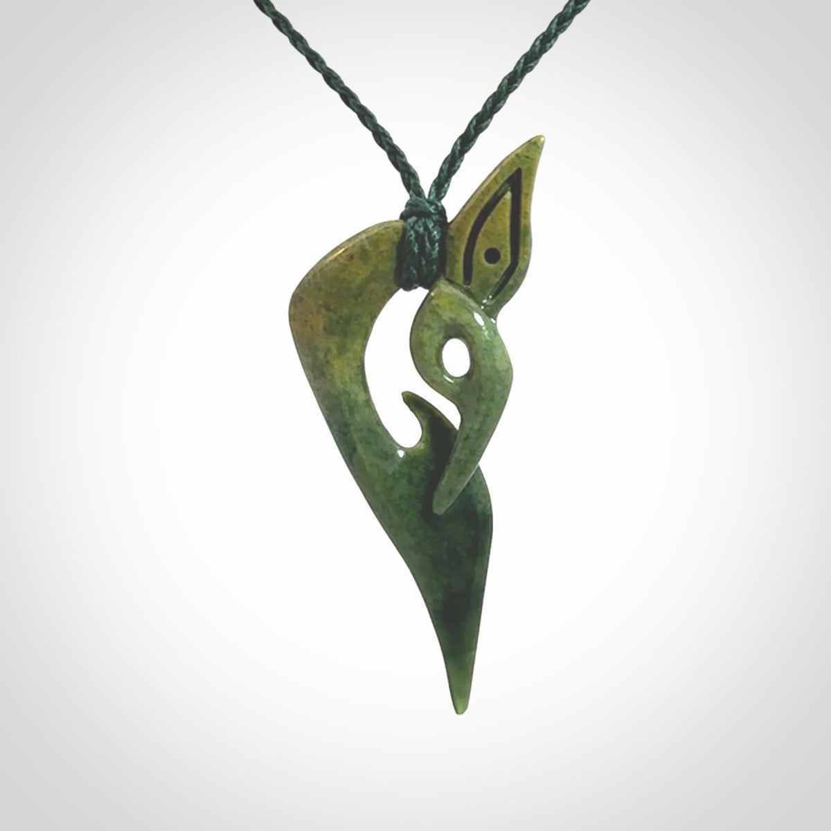 A Very Cool, Unique, Manaia Pendant, Carved in Flower Jade.