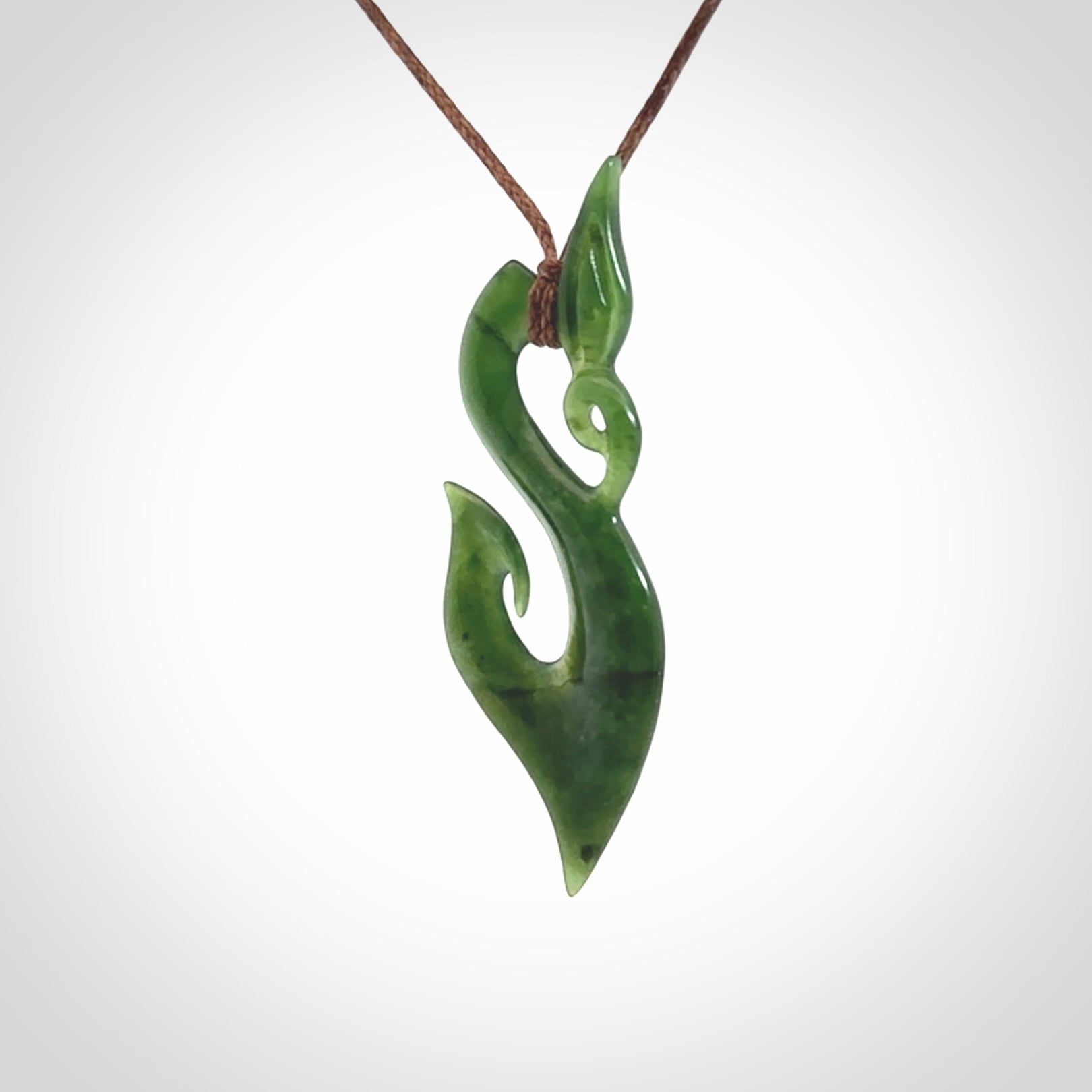Hand carved jade manaia pendant