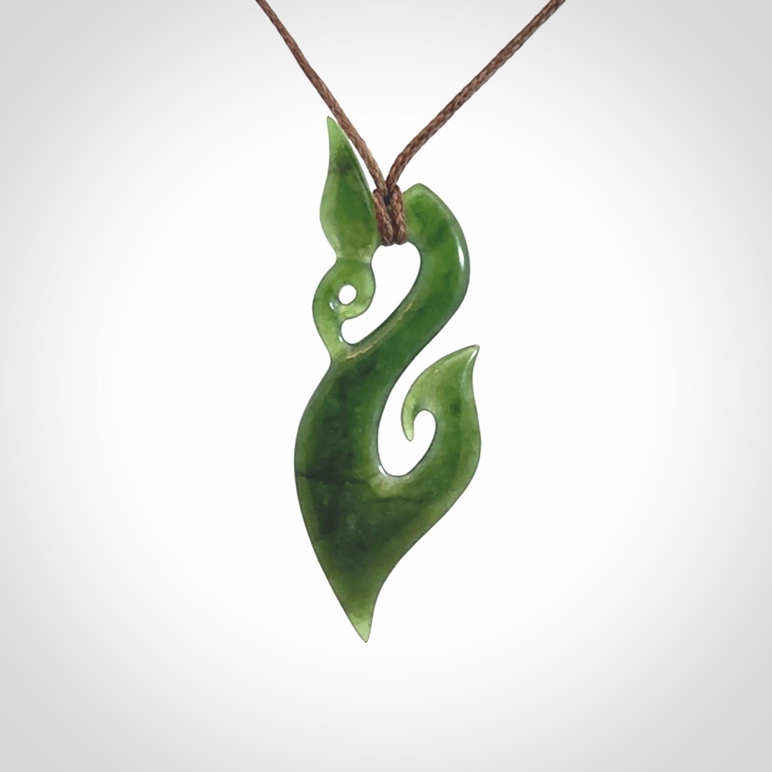 Hand carved jade manaia pendant