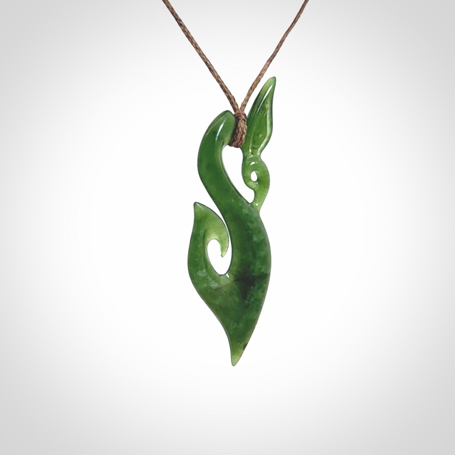Hand carved jade manaia pendant