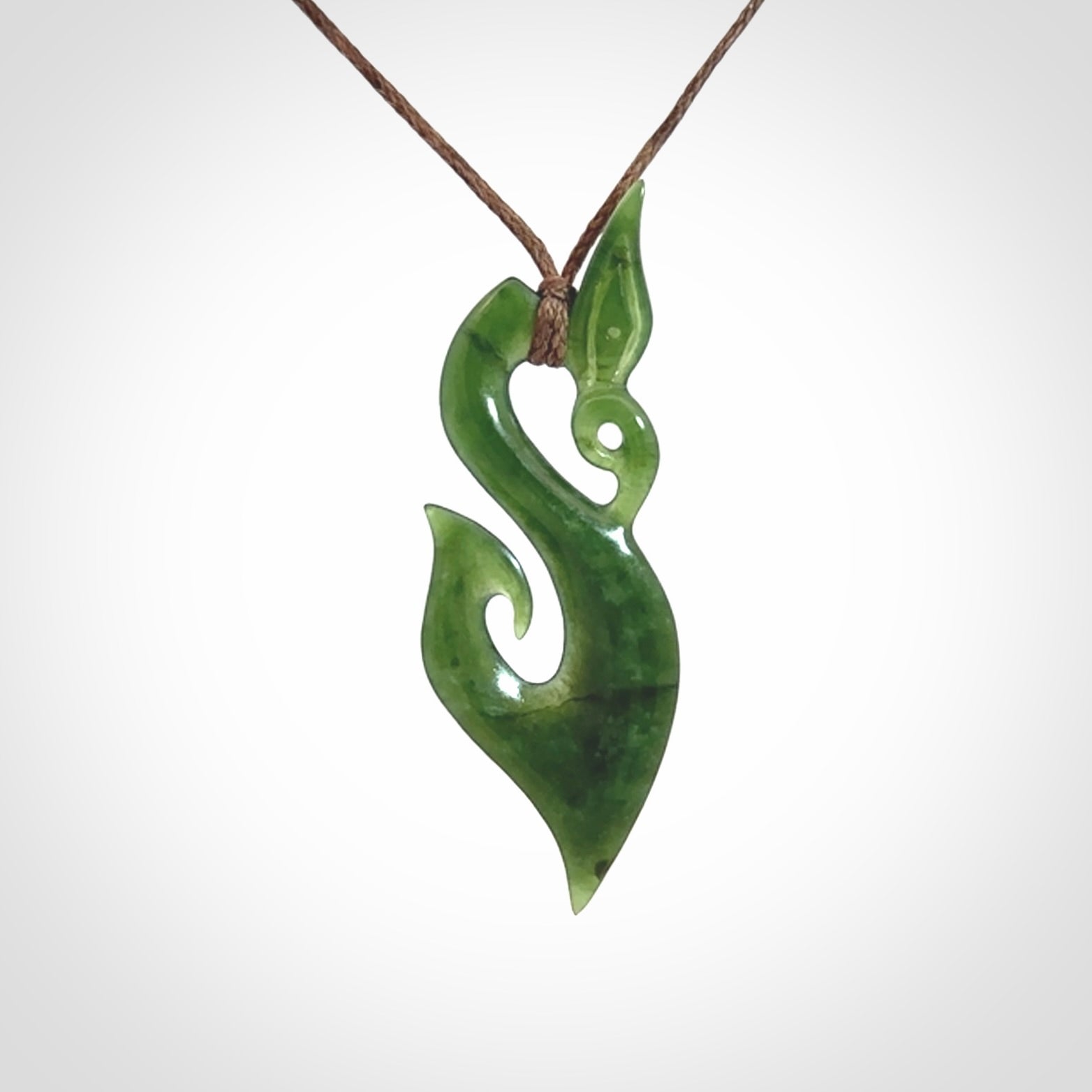 Hand carved jade manaia pendant