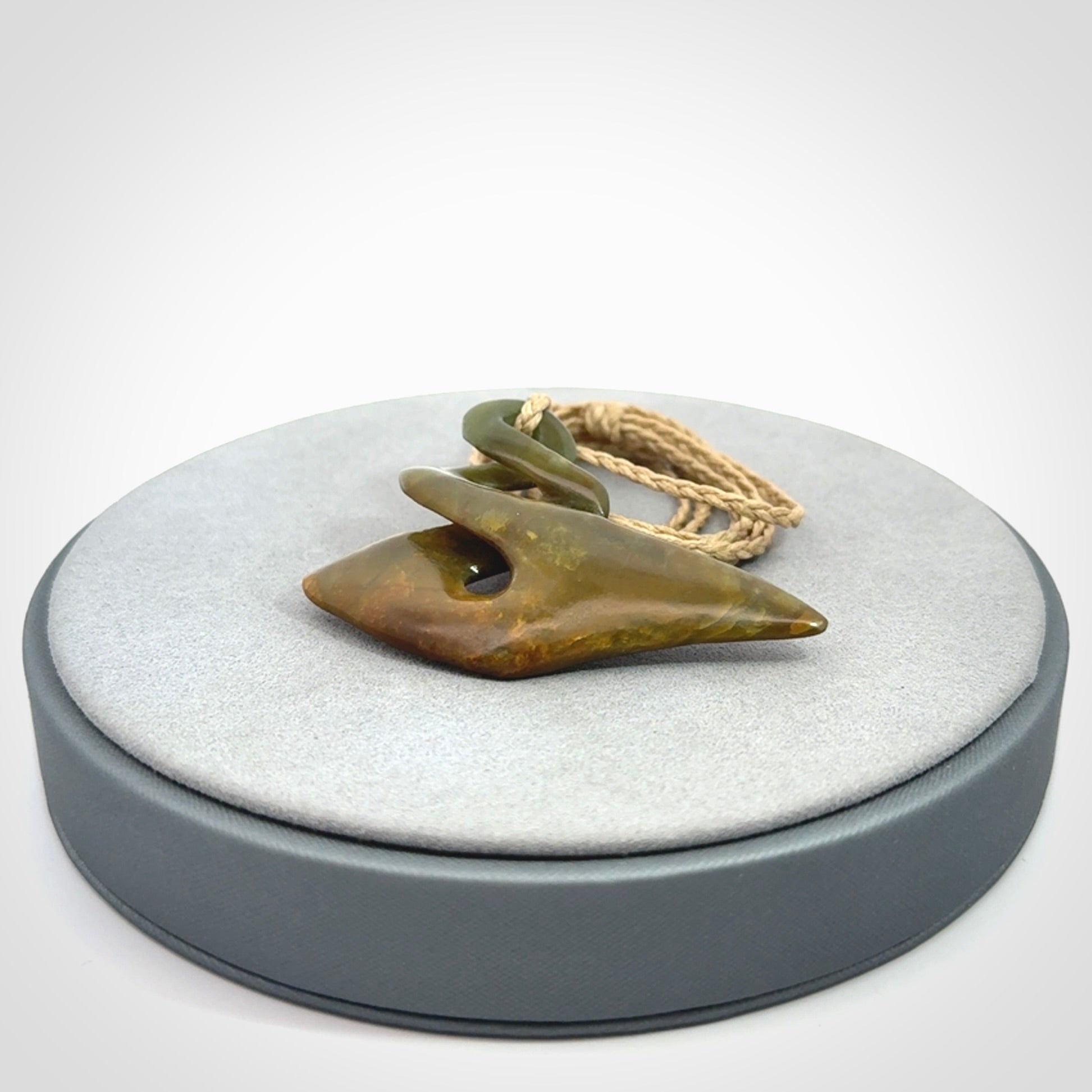 A Striking Flower Jade Twist Pendant