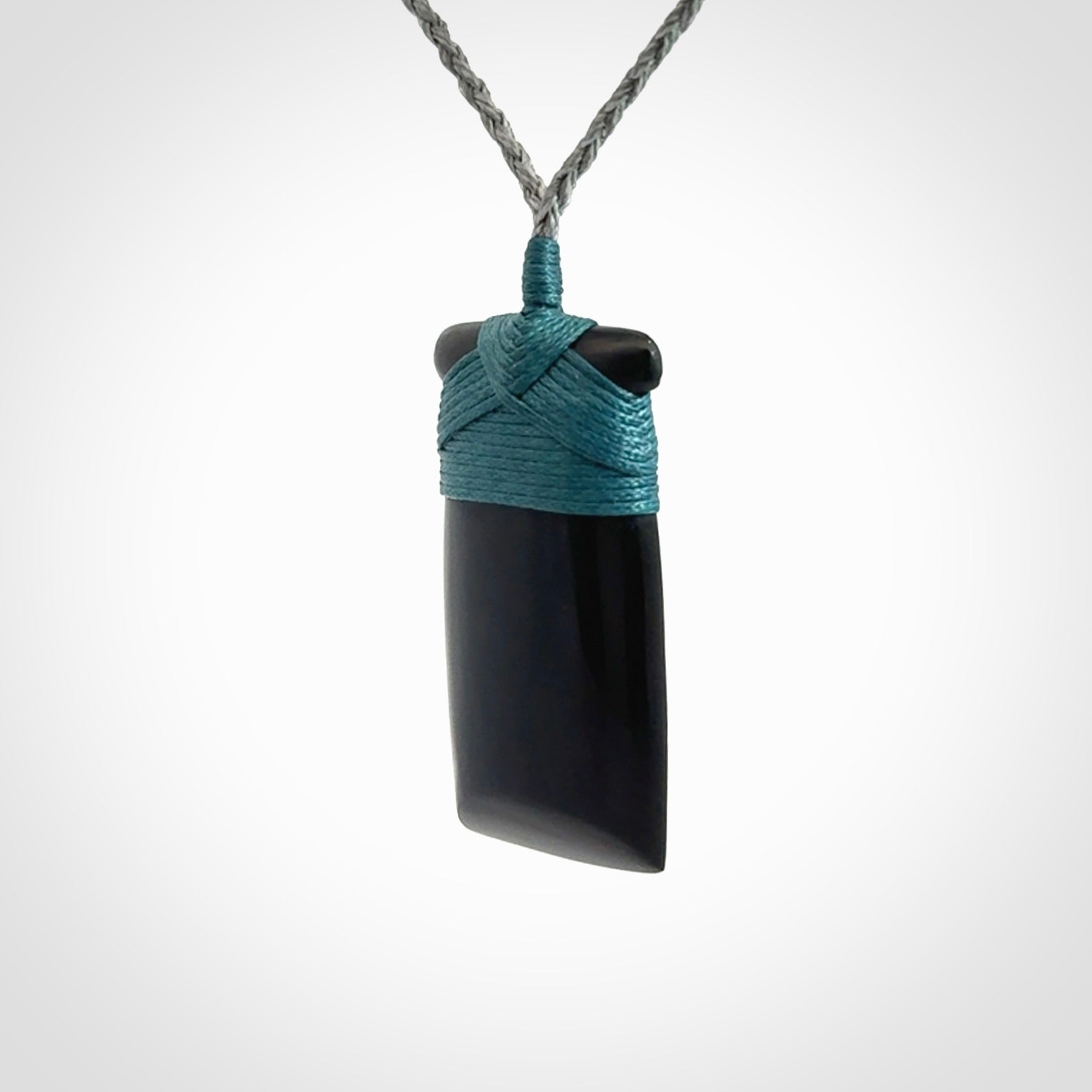 Bold and beautiful black jade toki pendants