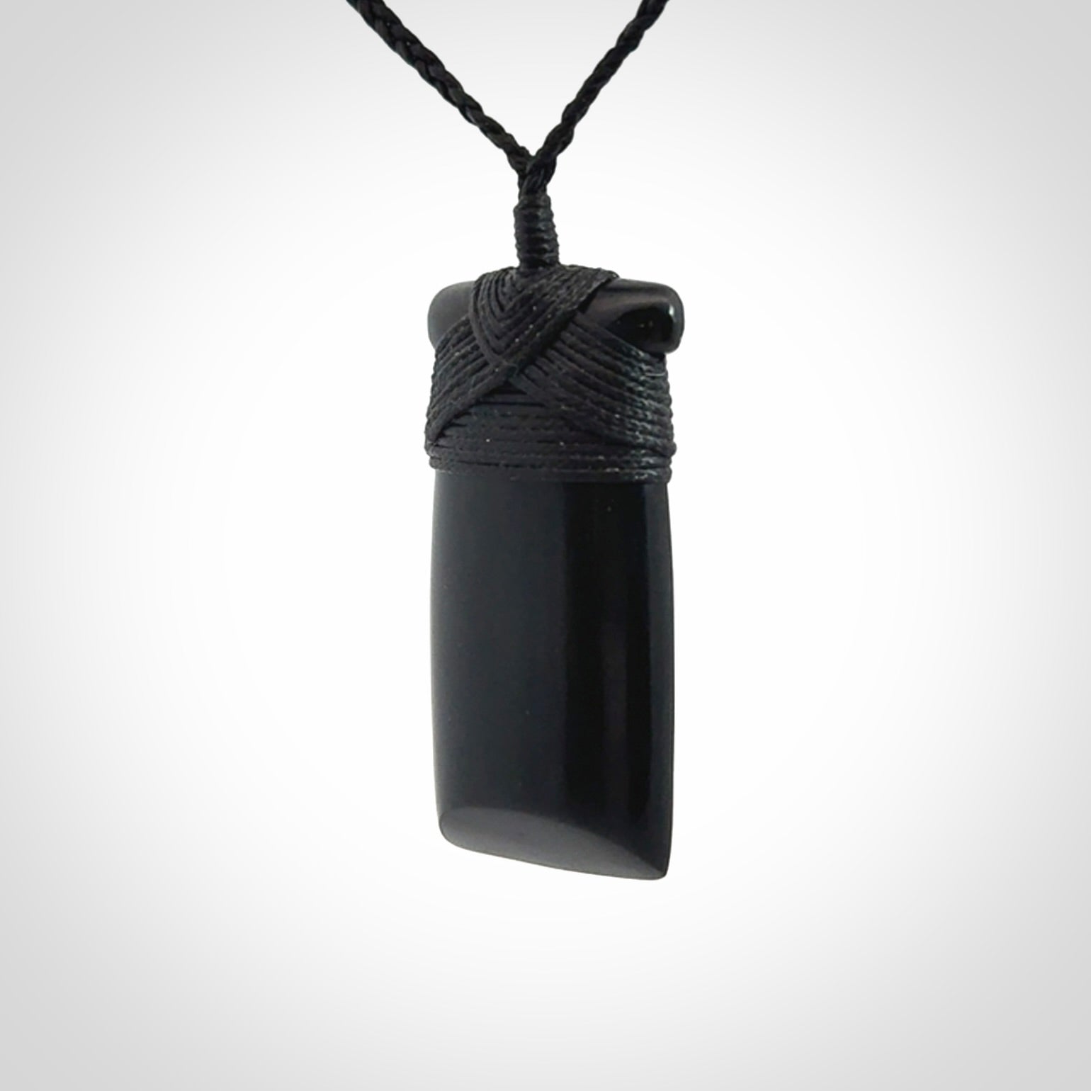 Bold and beautiful black jade toki pendants
