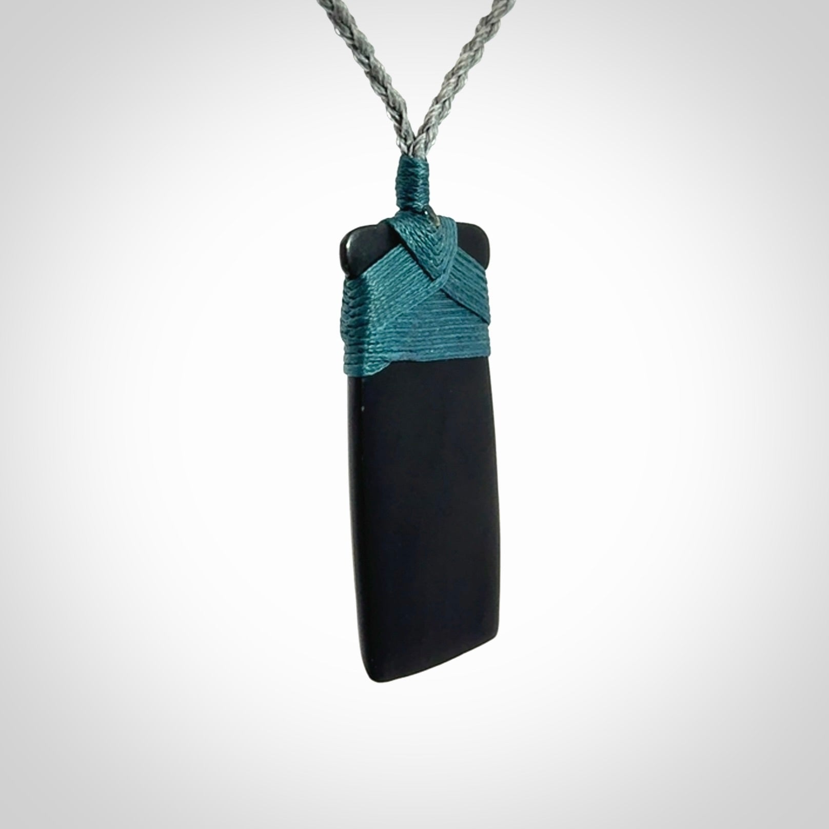 Bold and beautiful black jade toki pendants