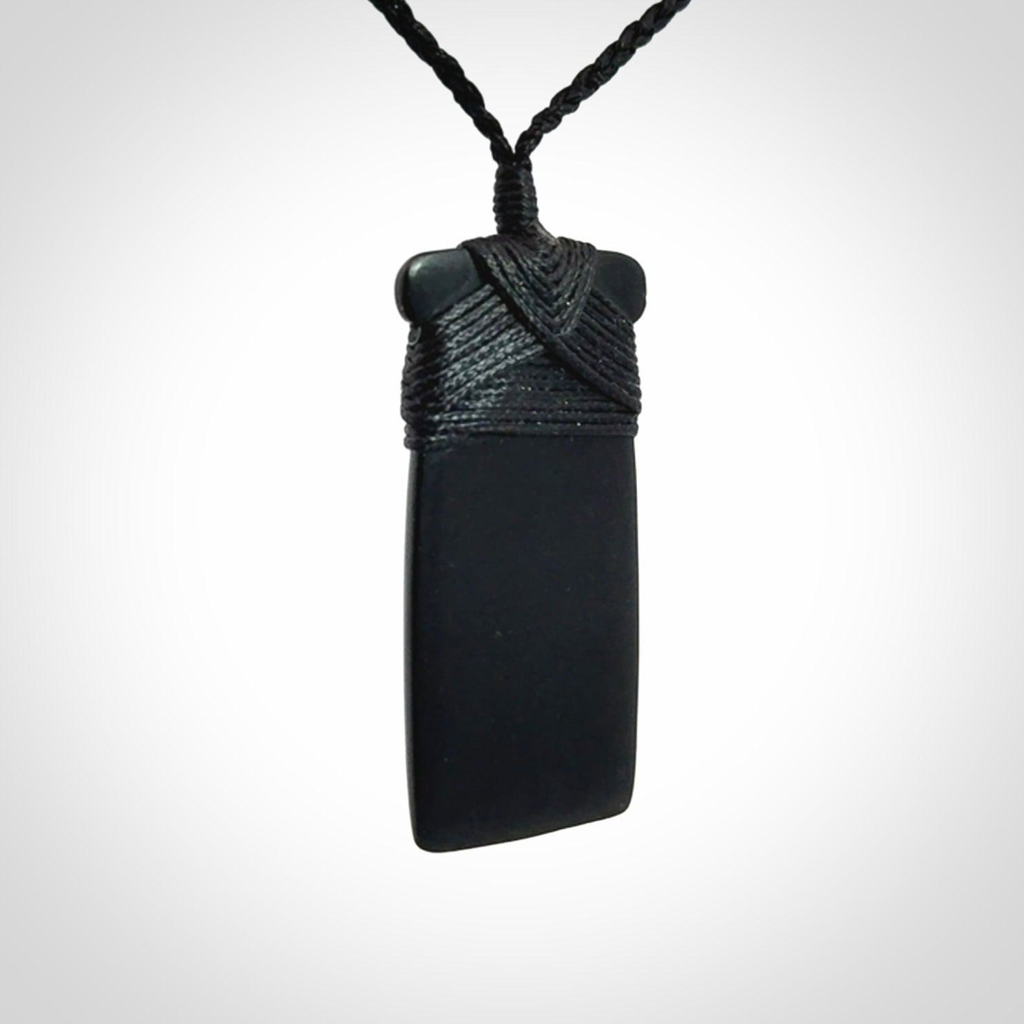Bold and beautiful black jade toki pendants