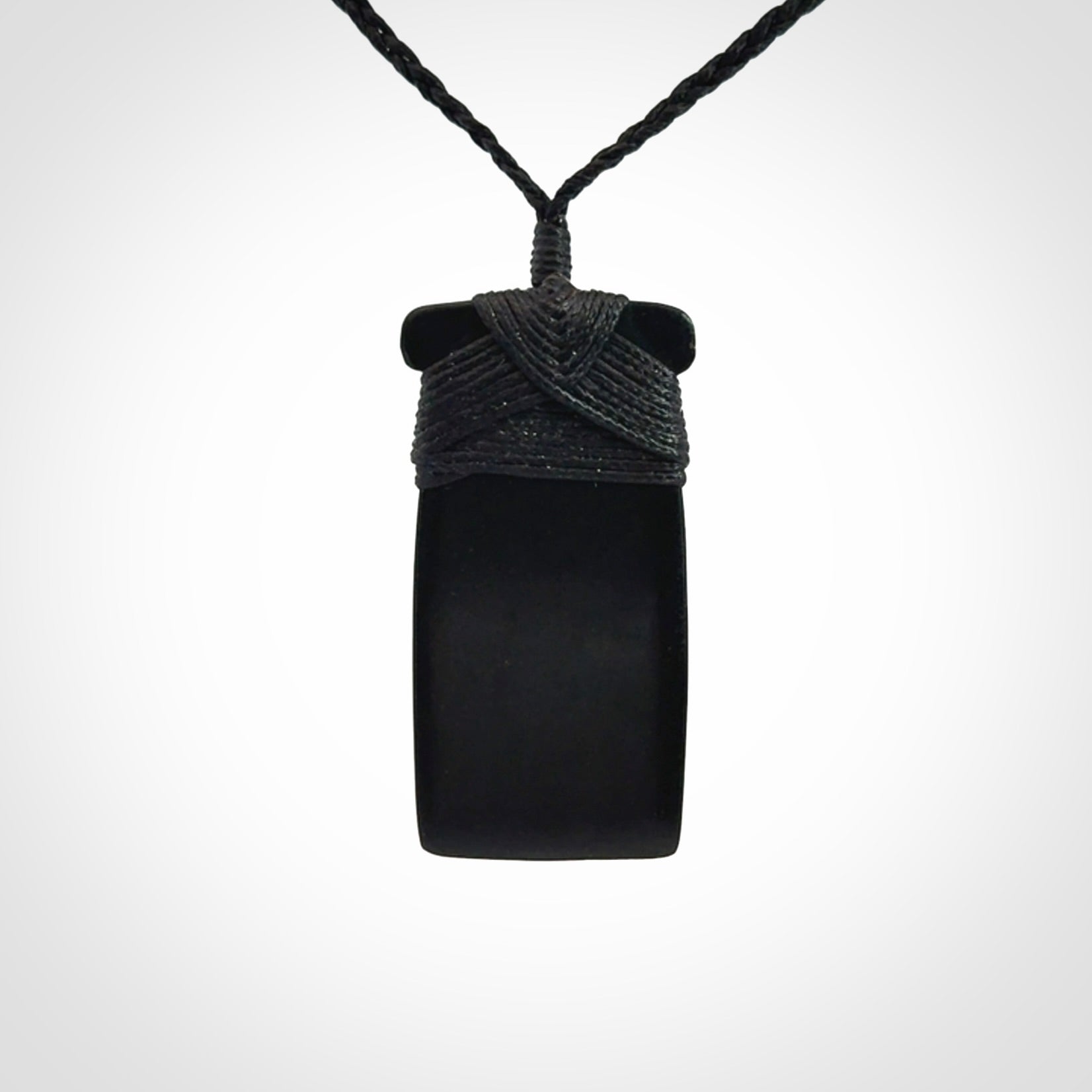 Bold and beautiful black jade toki pendants