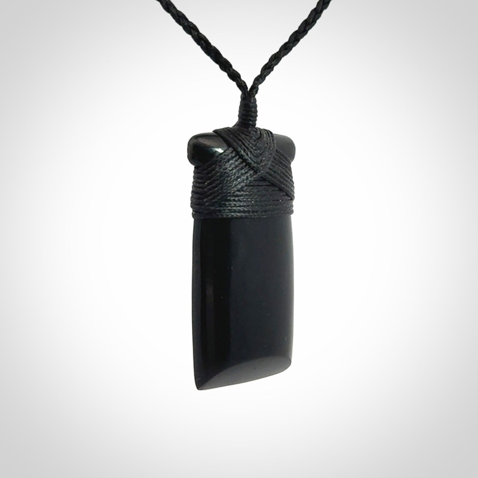 Bold and beautiful black jade toki pendants