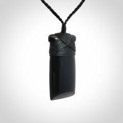 Bold and beautiful black jade toki pendants