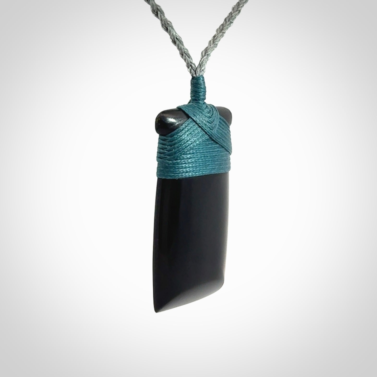 Bold and beautiful black jade toki pendants