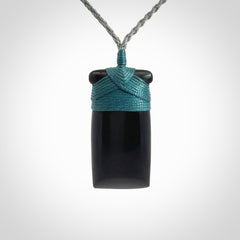 Bold and beautiful black jade toki pendants