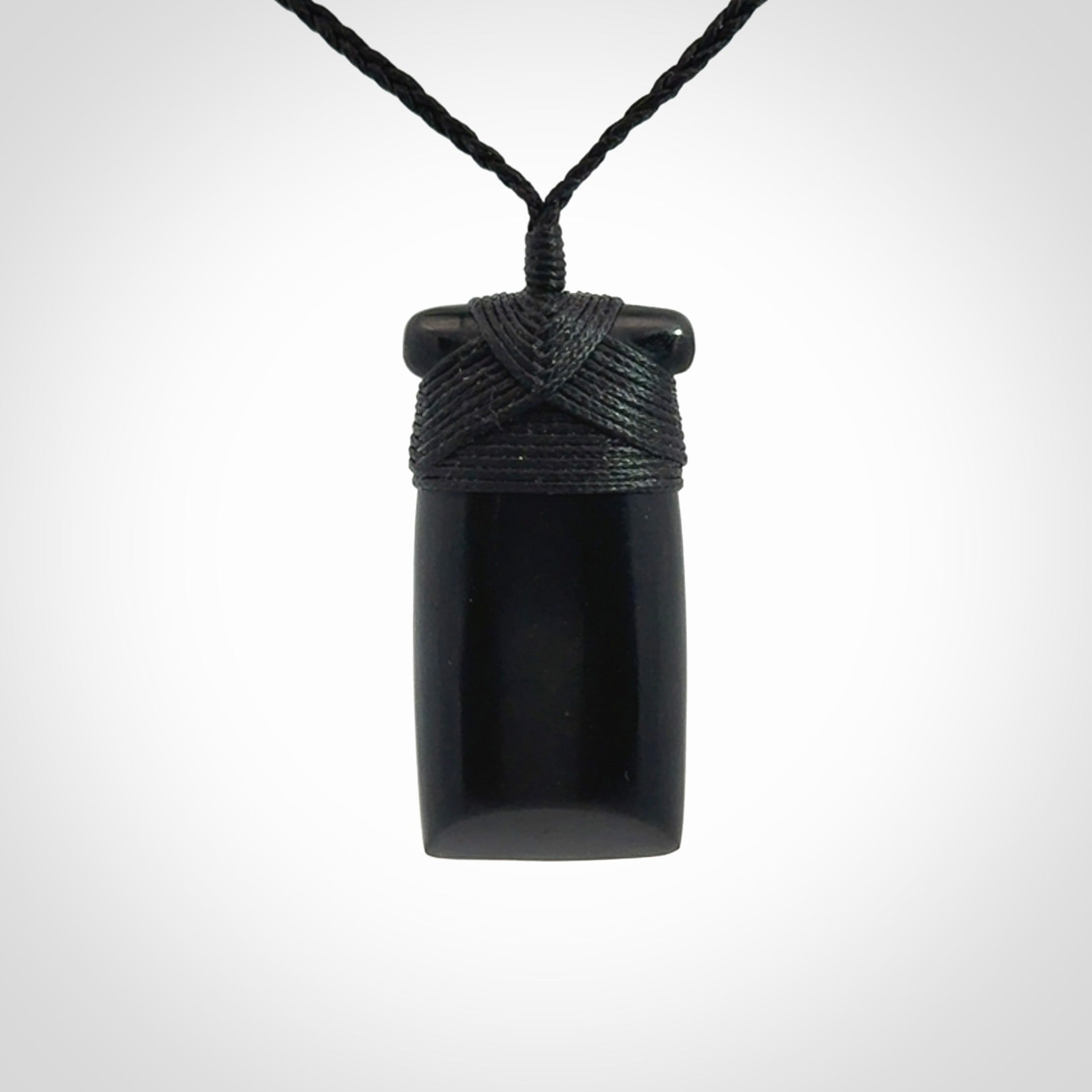 Bold and beautiful black jade toki pendants