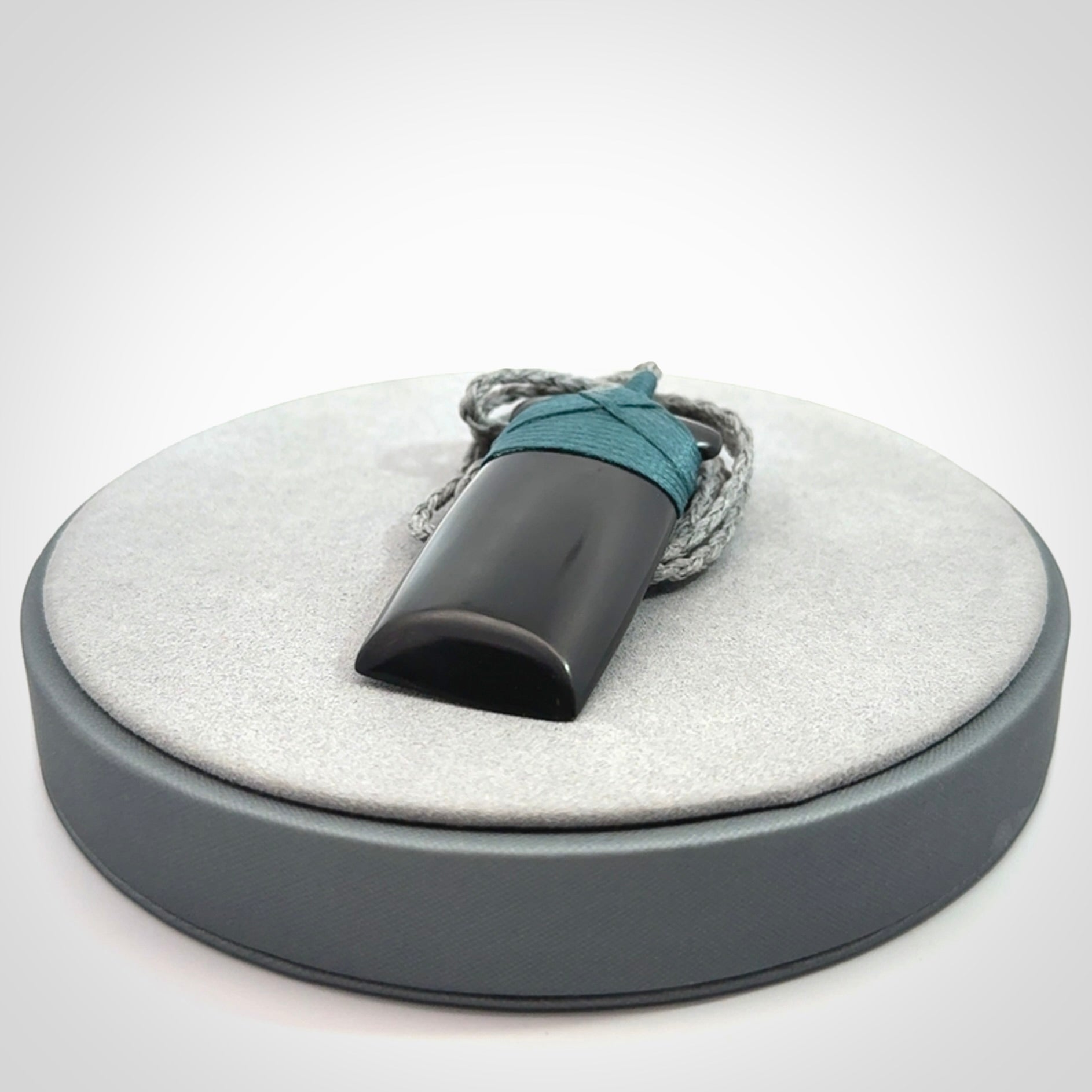 Bold and beautiful black jade toki pendants