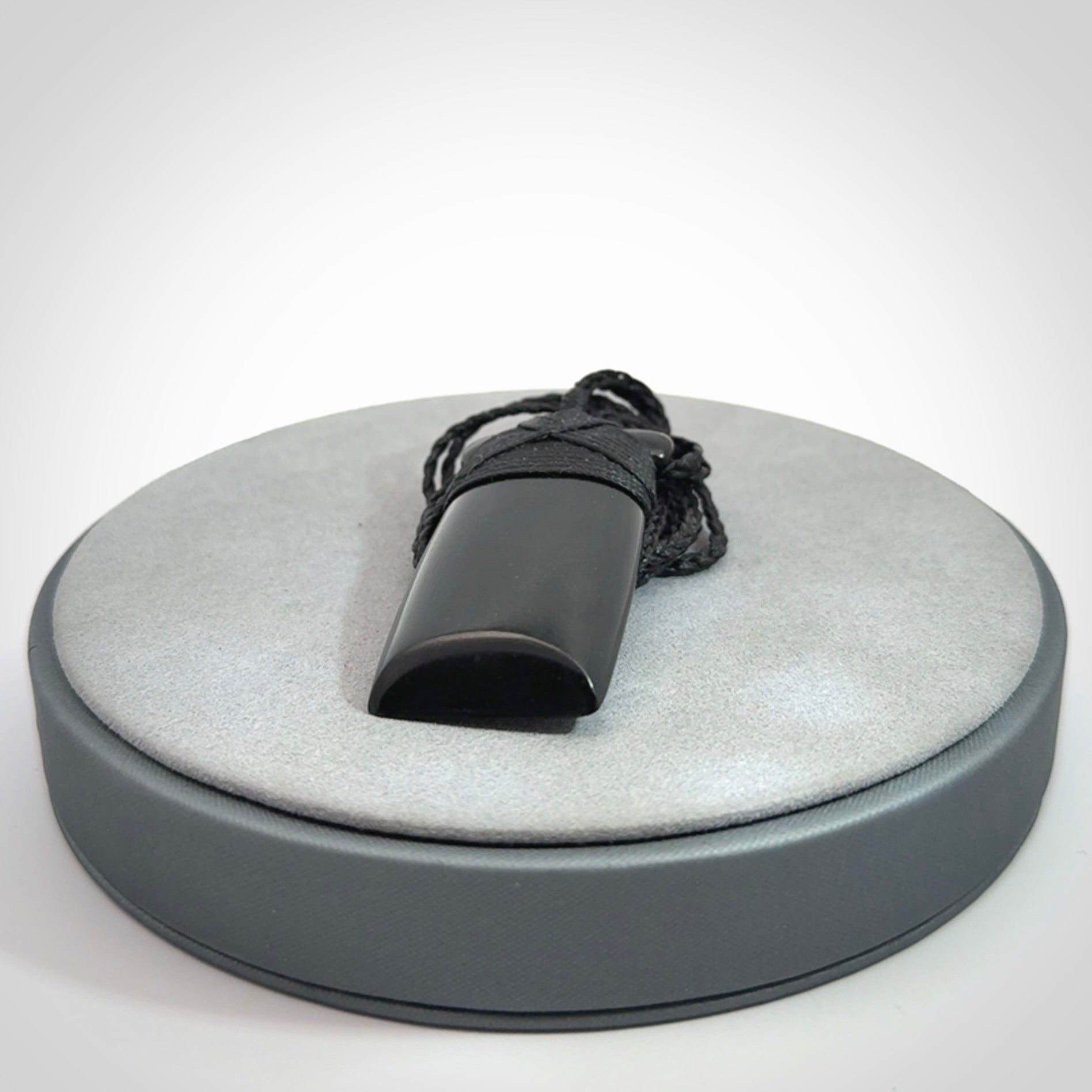 Bold and beautiful black jade toki pendants