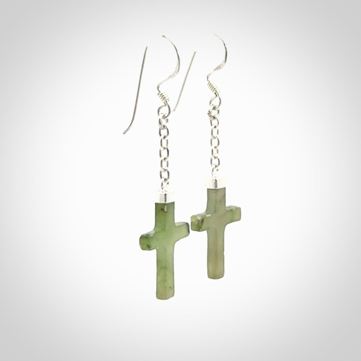 Hand carved small Nephrite jade cross earrings. Made by NZ Pacific from real jade. Online jewellery for sale online by NZ Pacific.